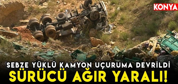 Sebze yüklü kamyon uçuruma devrildi: Sürücü ağır yaralı!