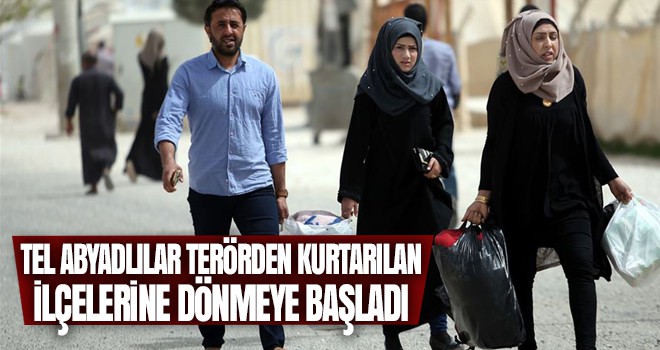 Tel Abyadlılar terörden kurtarılan ilçelerine dönmeye başladı