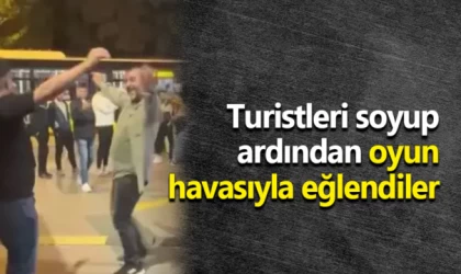 Turistleri soyup ardından oyun havasıyla eğlendiler